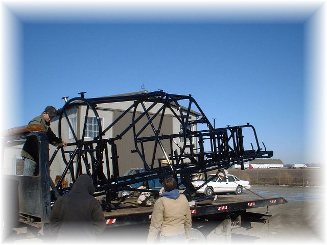 Loading a large monster truck frame at W. Kendall